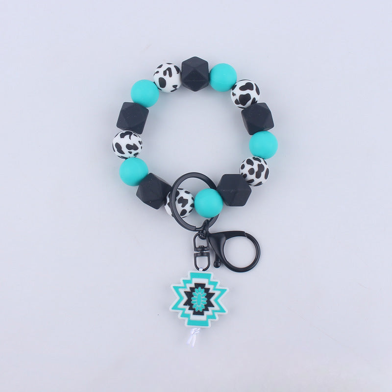 Wholesale Cartoon Bull Head Aztec Cross Silicone Beaded Wrist Keychain