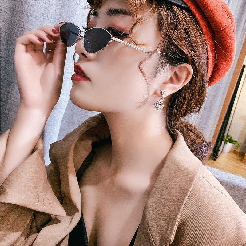 Wholesale exaggerated micro-inlaid zircon metal texture snake earrings