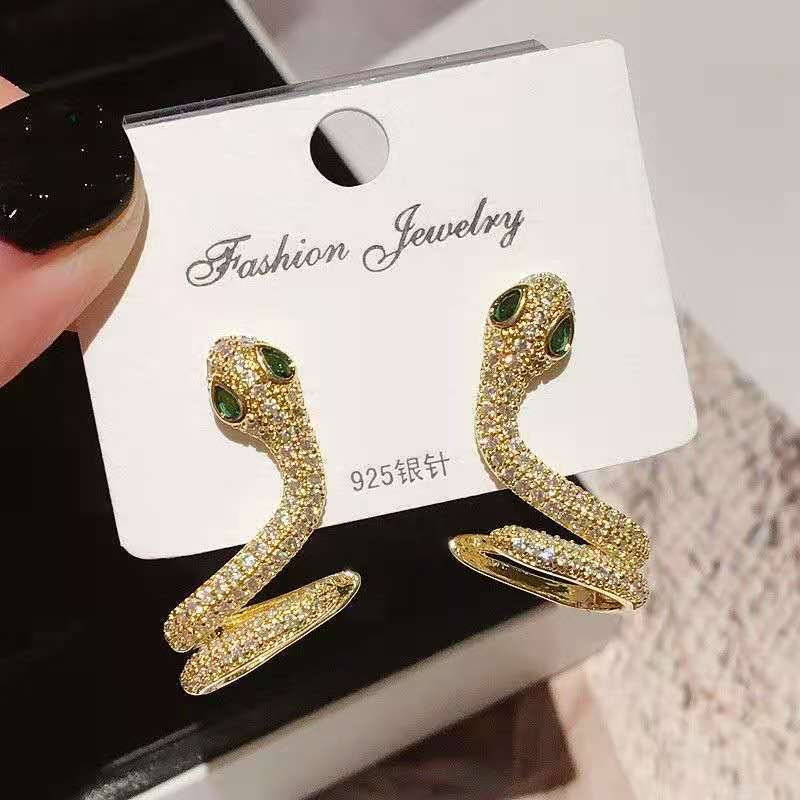 Wholesale exaggerated micro-inlaid zircon metal texture snake earrings