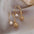 Wholesale Moon tassel rhinestone earrings  irregular pearl earrings