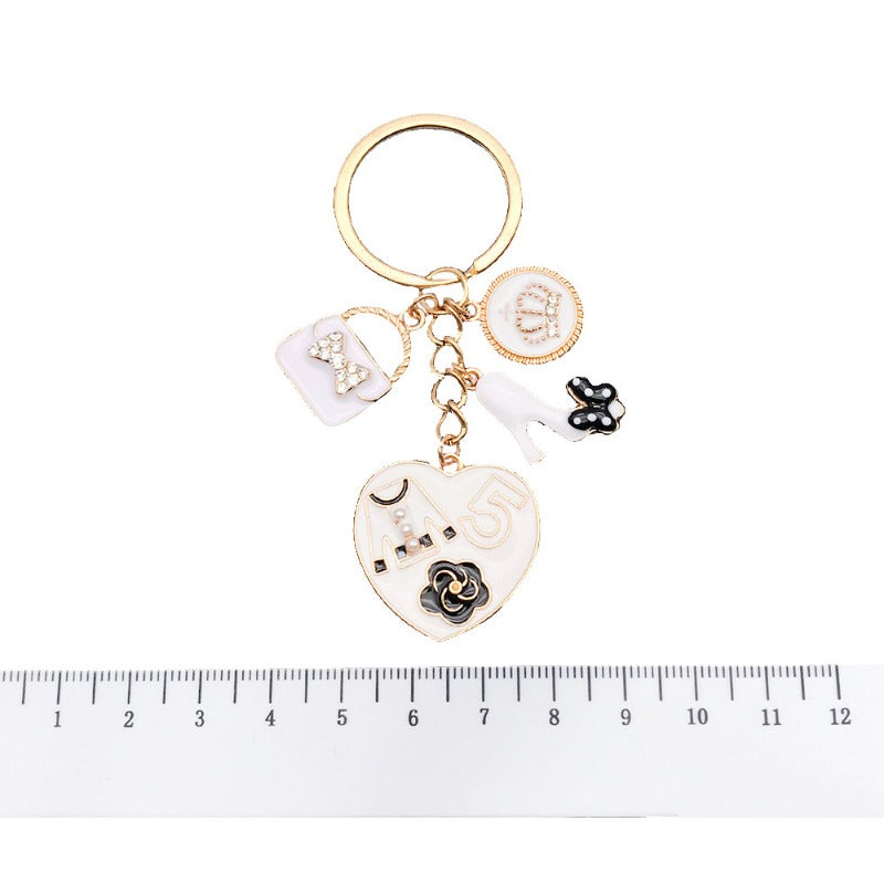 Wholesale White Oil Drop Bag Keychain ACC-KC-Luneng007