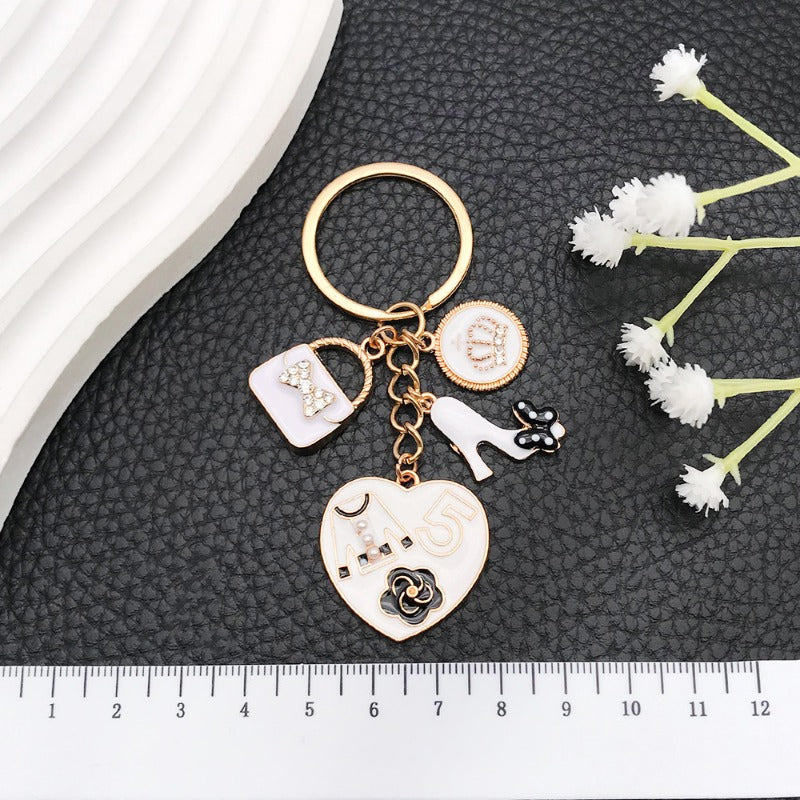 Wholesale White Oil Drop Bag Keychain ACC-KC-Luneng007