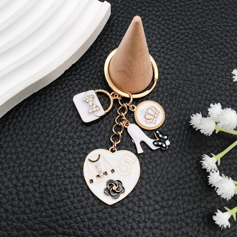 Wholesale White Oil Drop Bag Keychain ACC-KC-Luneng007