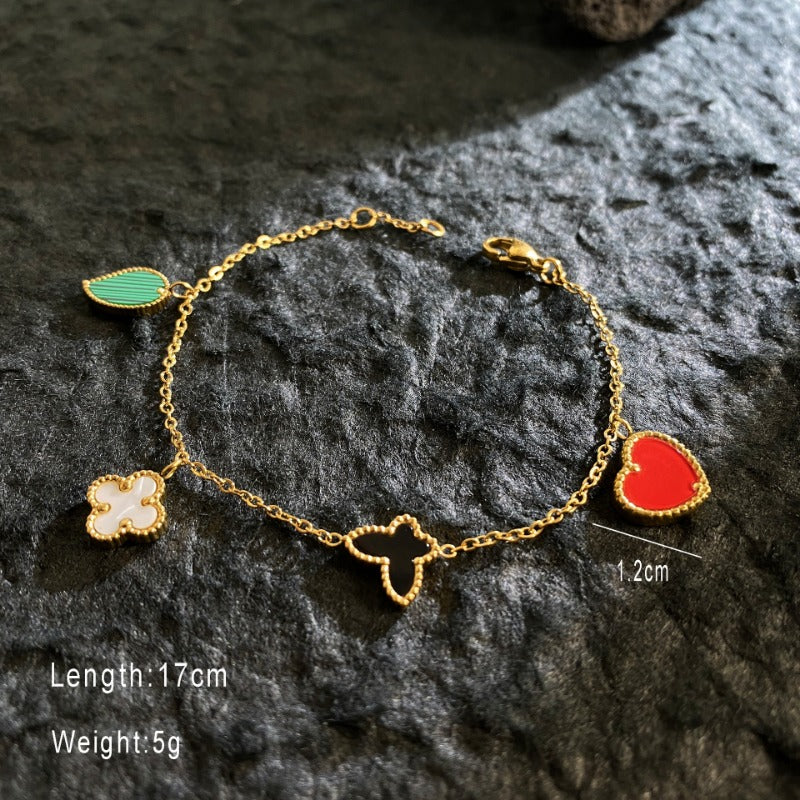 Wholesale Titanium Steel Gold Plated Laser Four Leaf Clover Pearl Bracelet ACC-BT-YuXun005