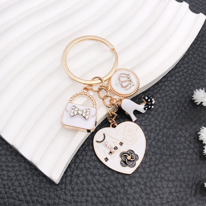 Wholesale White Oil Drop Bag Keychain ACC-KC-Luneng007