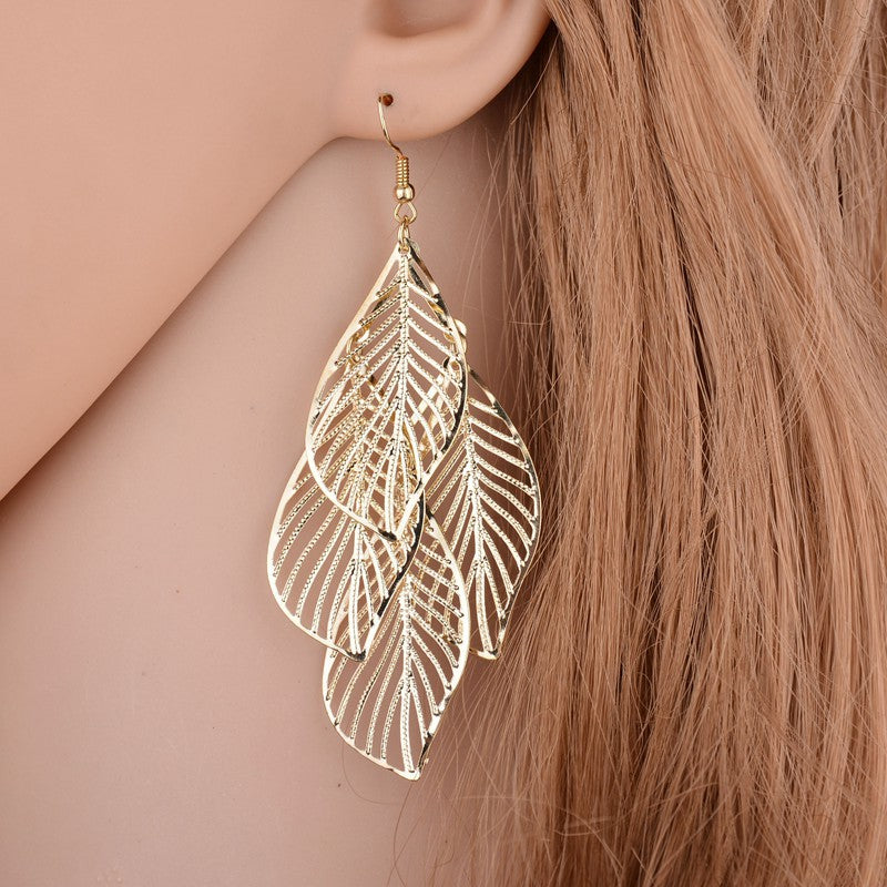 Wholesale Hollow Leaf Tassel Metal Women' s Earrings Party Wear Fashion Accessory