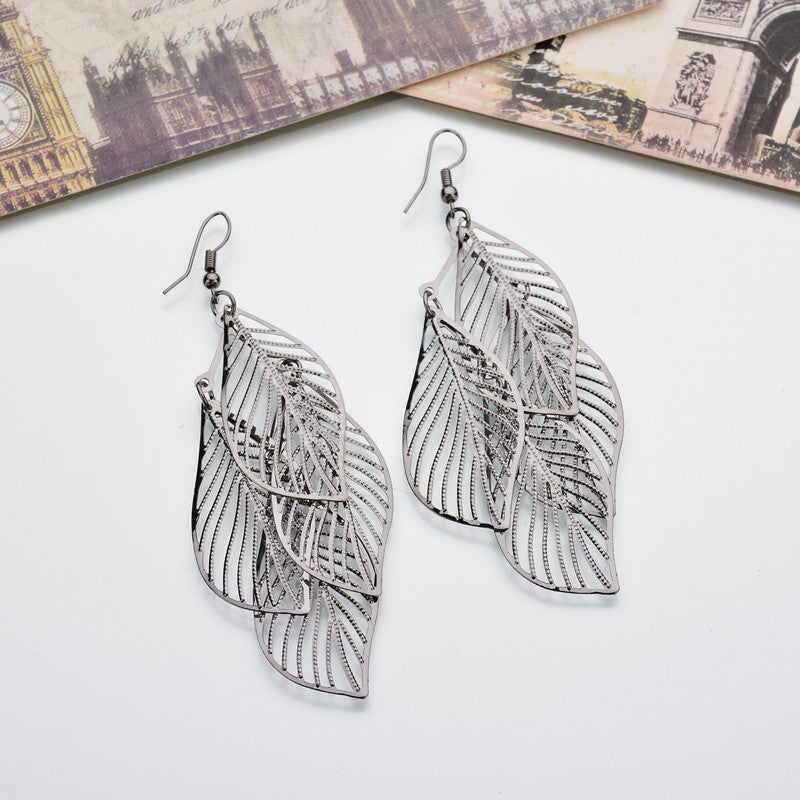 Wholesale Hollow Leaf Tassel Metal Women' s Earrings Party Wear Fashion Accessory
