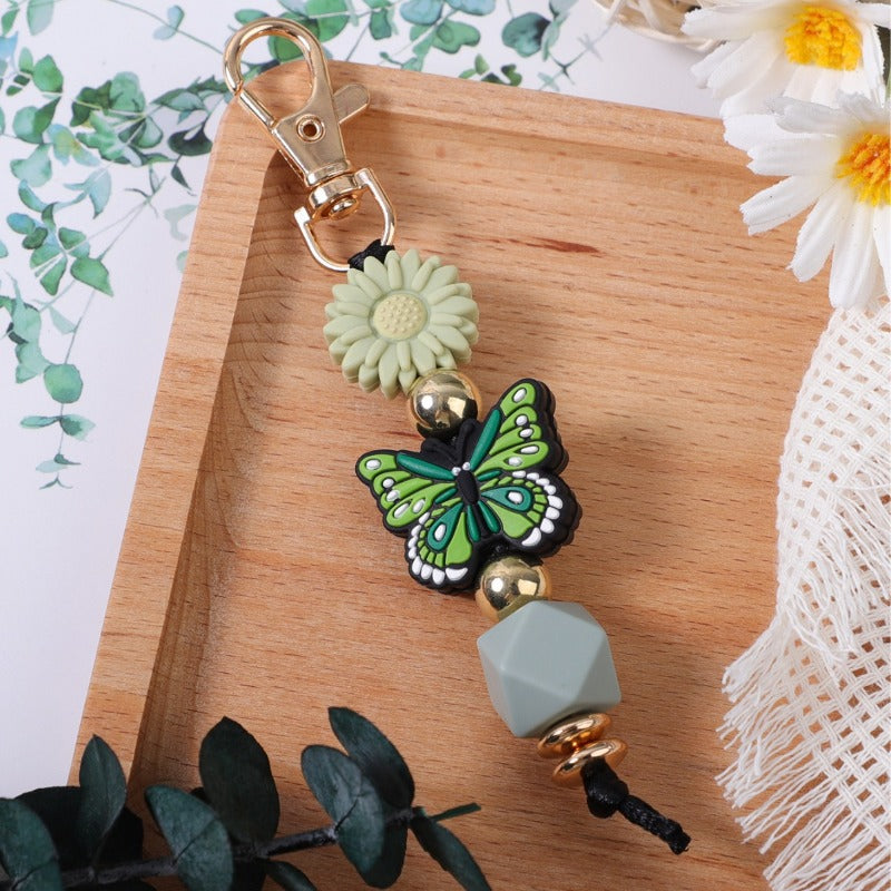 Wholesale Cartoon Colorful Butterfly Daisy Keychain ACC-KC-JiuYa007