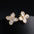 Wholesale four-leaf flower zircon ear clips earrings