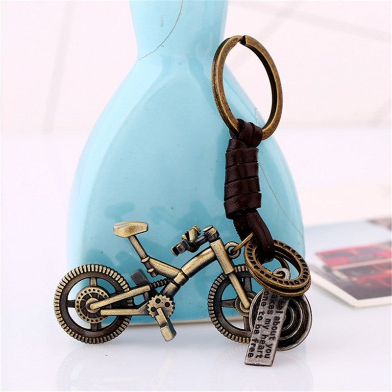 Wholesale alloy bicycle vintage woven cowhide keychain