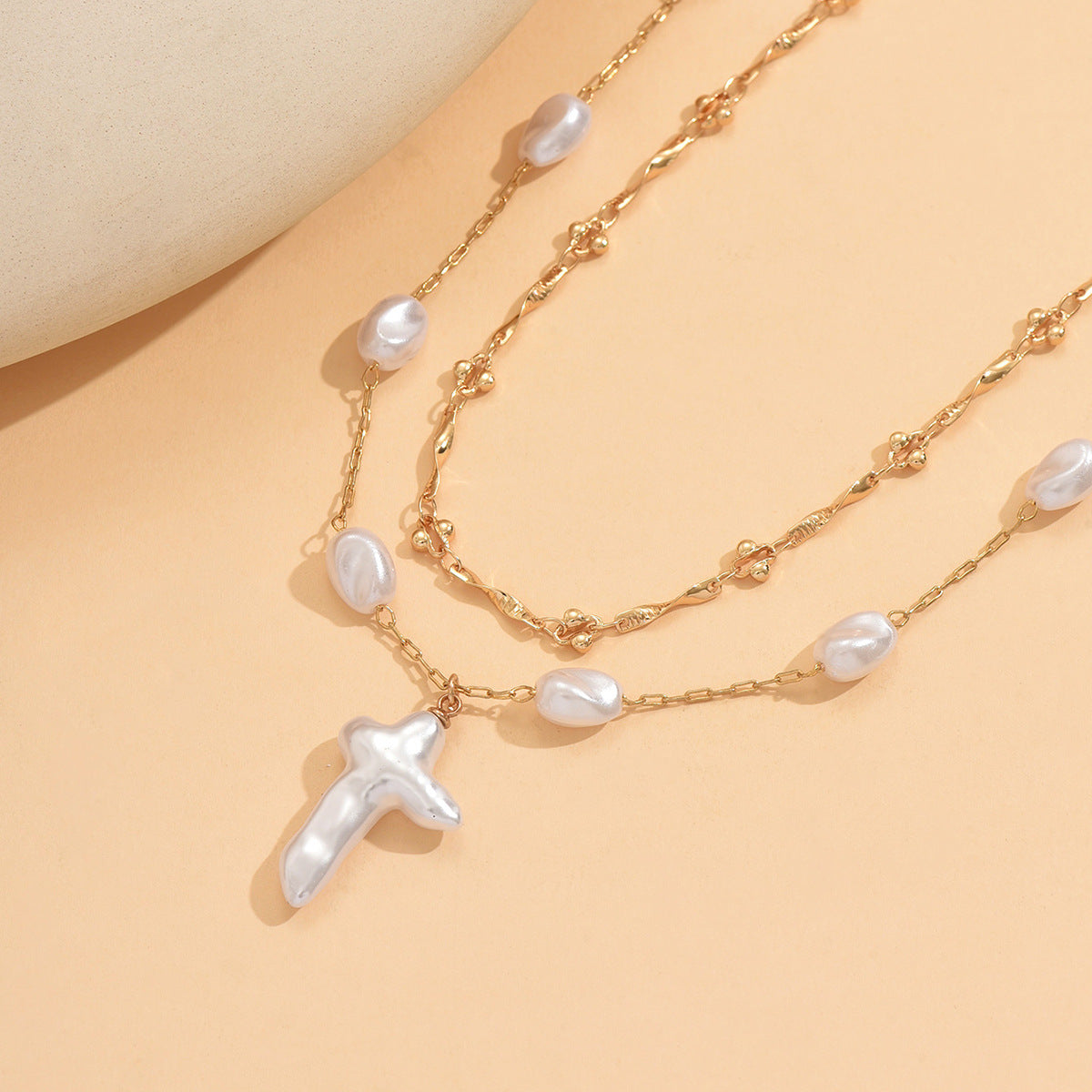 Wholesale  uniquely shaped faux pearl cross necklace