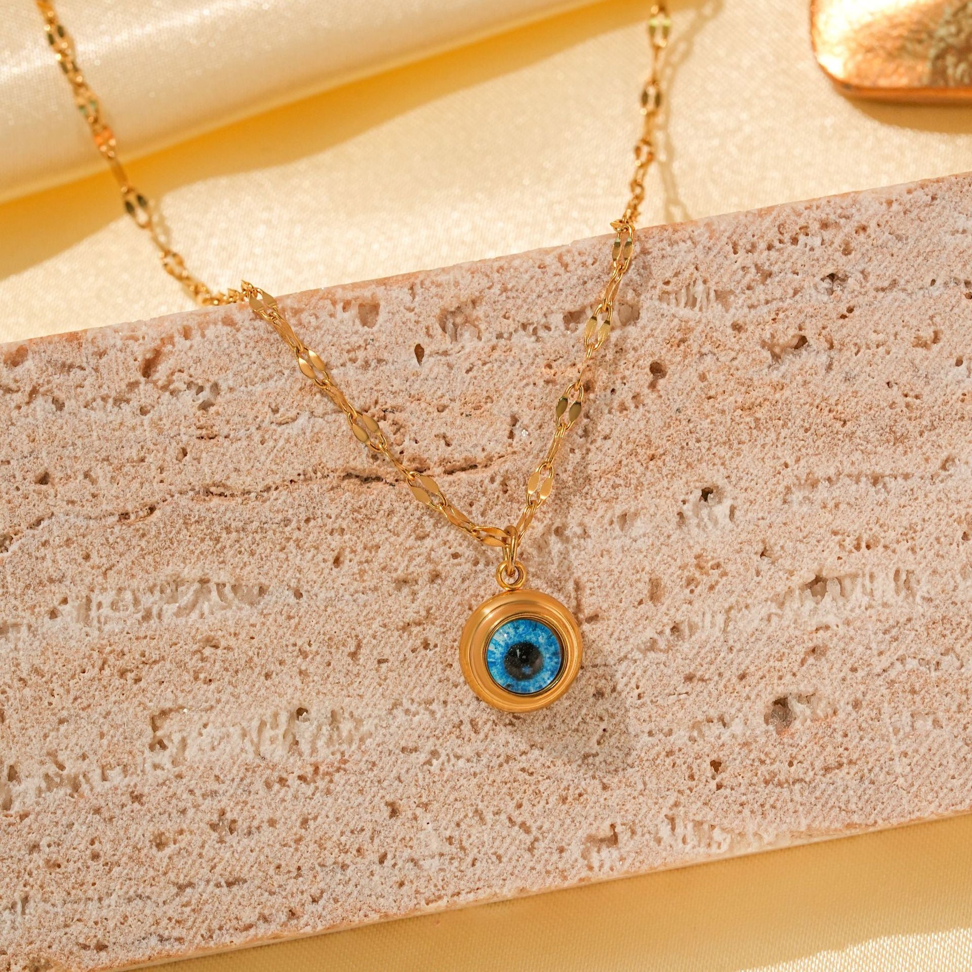 Wholesale Titanium Steel Retro Hip-hop Blue Devil's Eye Bow Love Pendant Evil Eye Necklace