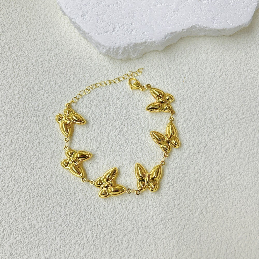 Wholesale  stainless steel three-dimensional hollow butterfly bracelet necklace suit