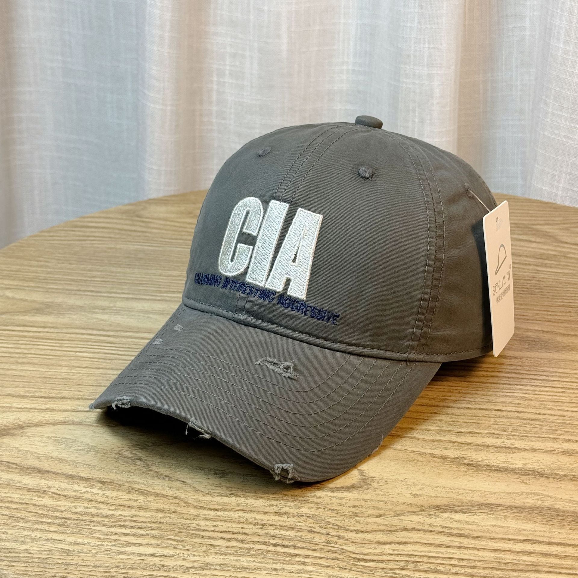 Wholesale Retro Embroidered Ripped Baseball Cap