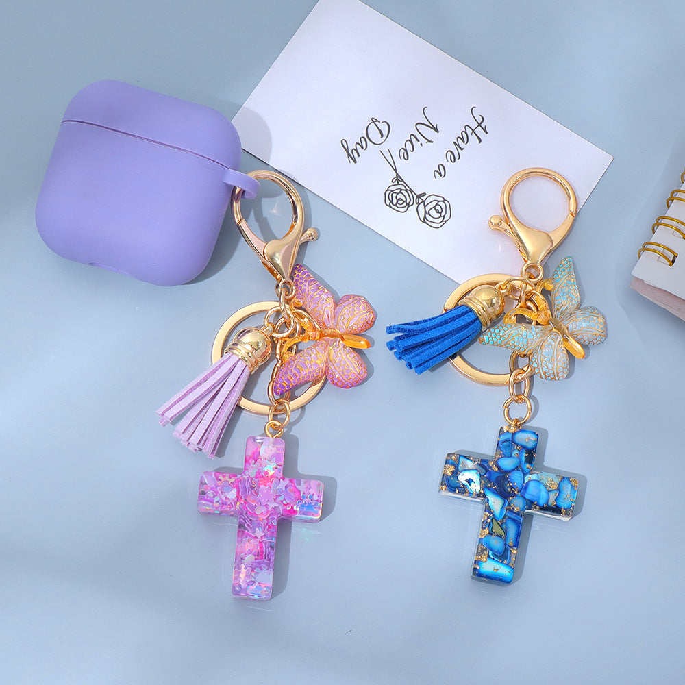 Wholesale Little Fresh Resin Butterfly Cross Keychain Tassel Bag Pendant Boutique Resale