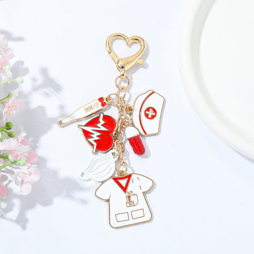 Wholesale Classic nurse cap thermometer pill mask heartbeat nurse suit zinc alloy keychain