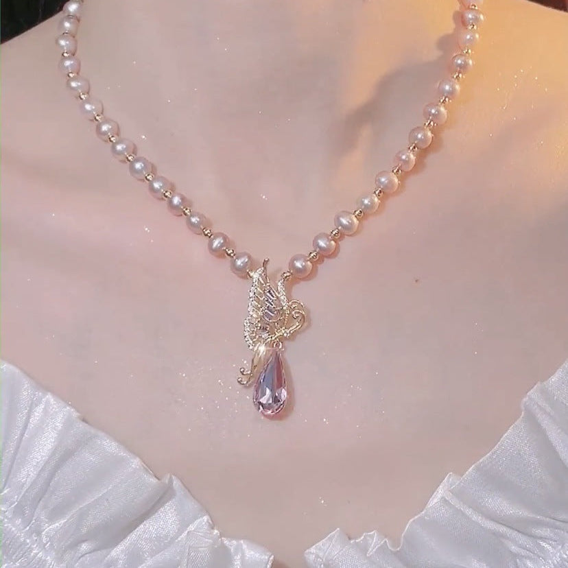Wholesale Light luxury butterfly pearl sweater necklace