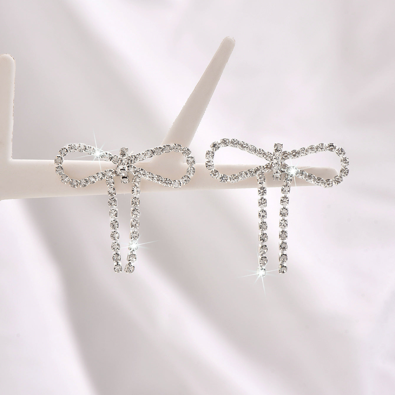 Wholesale Super Flash Claw Chain Full Diamond Bow Earrings
