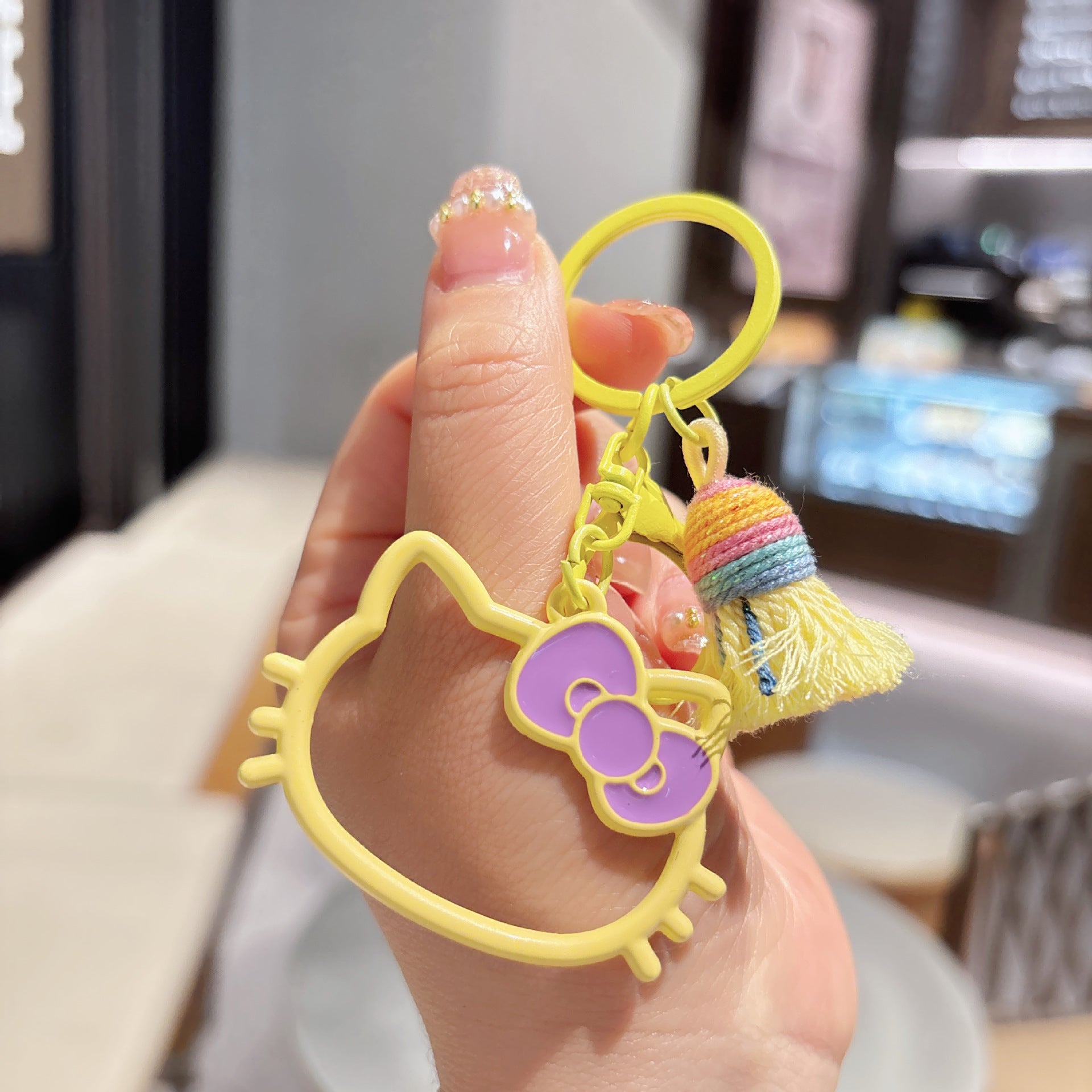 Wholesale hollow paint KT cat alloy key chain cute cartoon girl bag decoration