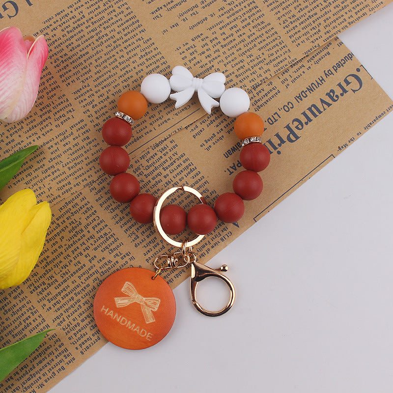 Wholesale Mother' s Day Handmade Gift: Bow-Shaped Silicone Keychain Wristlet