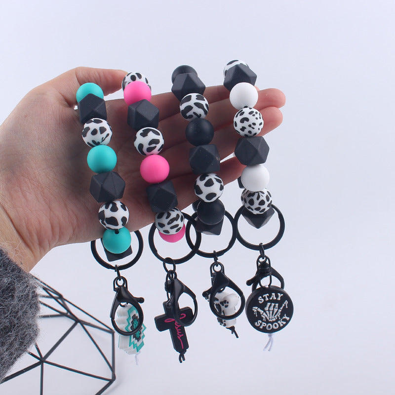 Wholesale Cartoon Bull Head Aztec Cross Silicone Beaded Wrist Keychain