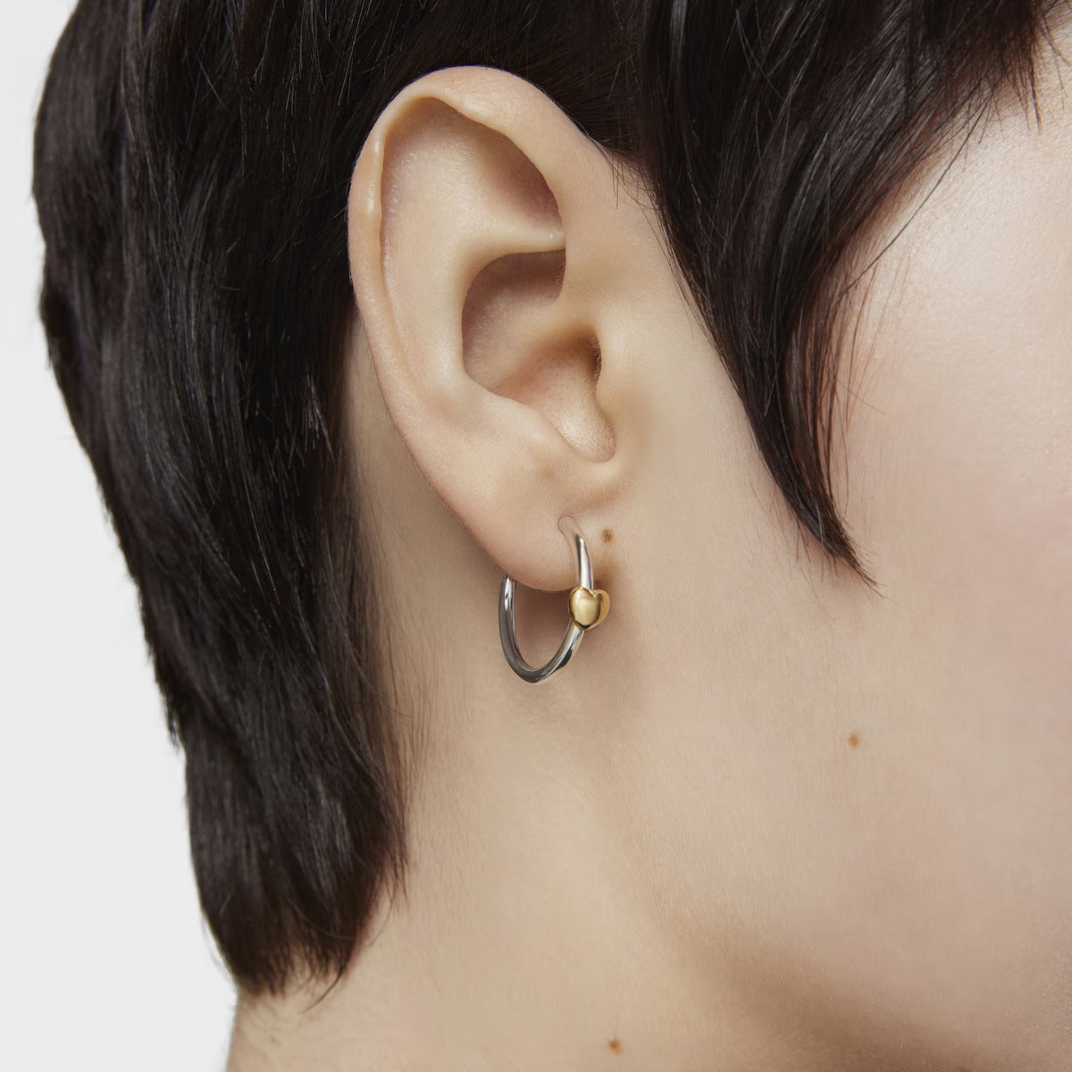 Wholesale 18k gold stainless steel gold and silver color matching simple love earrings