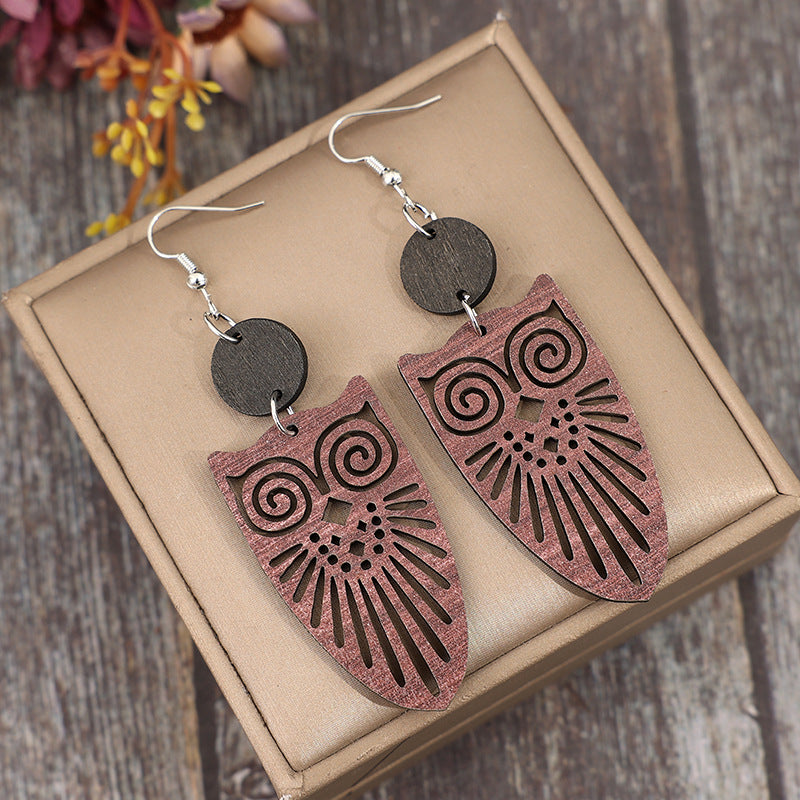 Wholesale Ethnic retro hollow owl stitching small round wood earrings