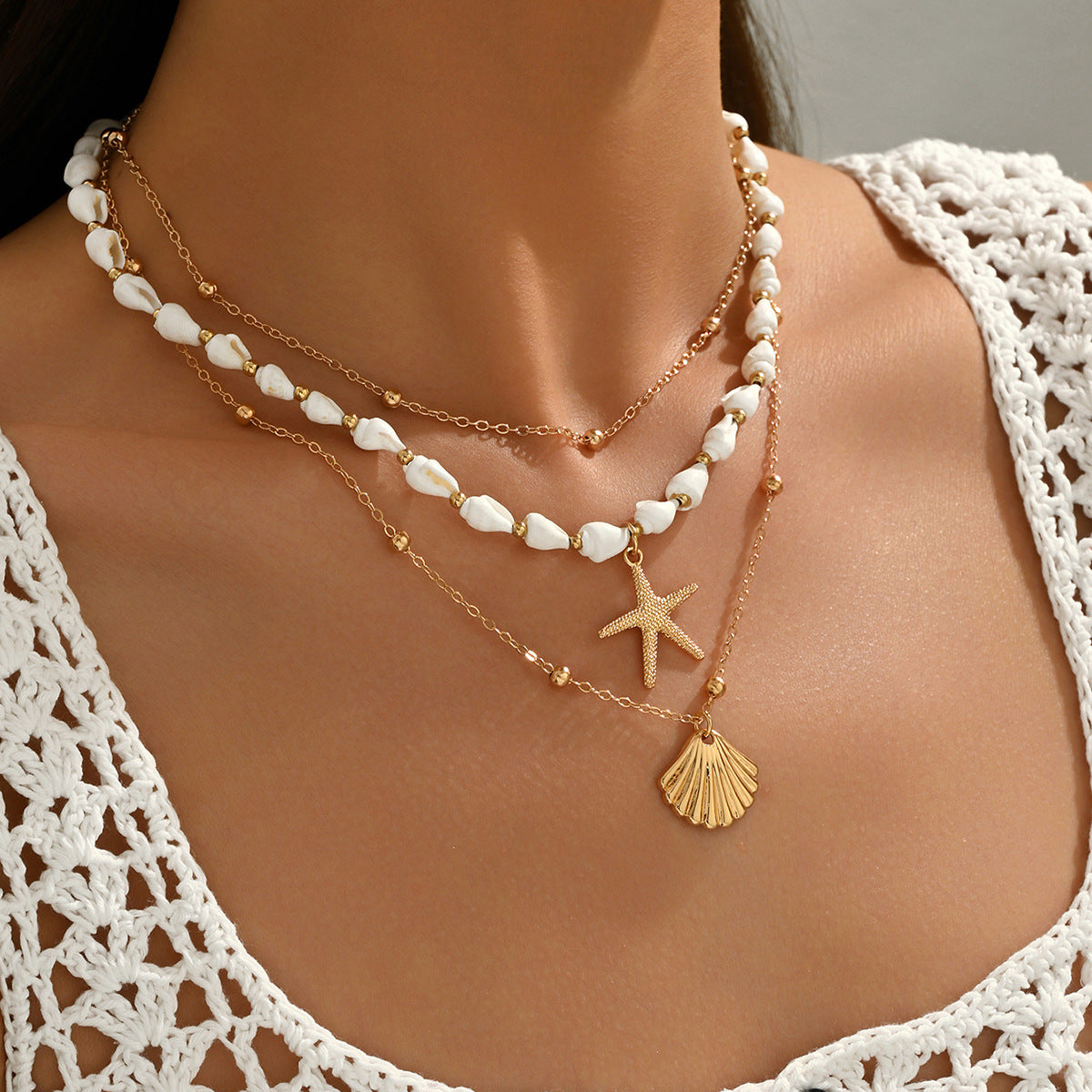 Collana all'ingrosso con ciondolo di stelle marine e conchiglie in stile resort oceanico