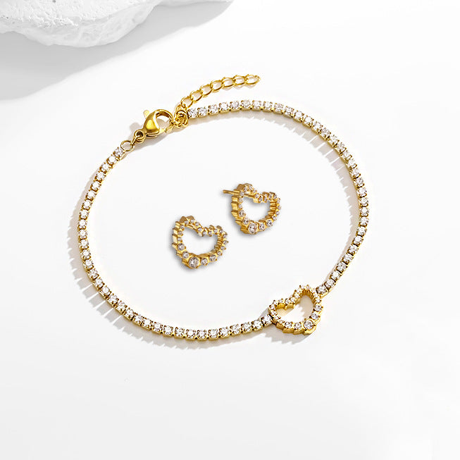 Wholesale Titanium steel heart-shaped necklace earrings and bracelet set inlaid with zircon.