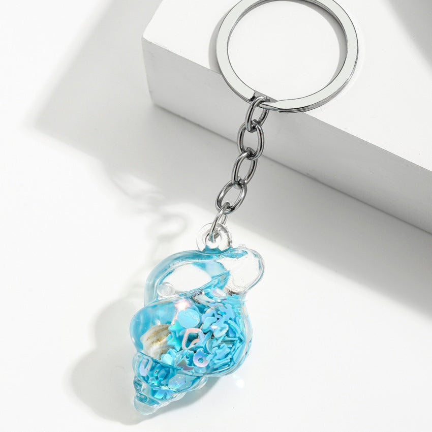 Wholesale Trendy Blue Acrylic Sea Shell Flowing Sand Keychain Charm Fashion Bag Decoration Creative Gift For Any Ocn