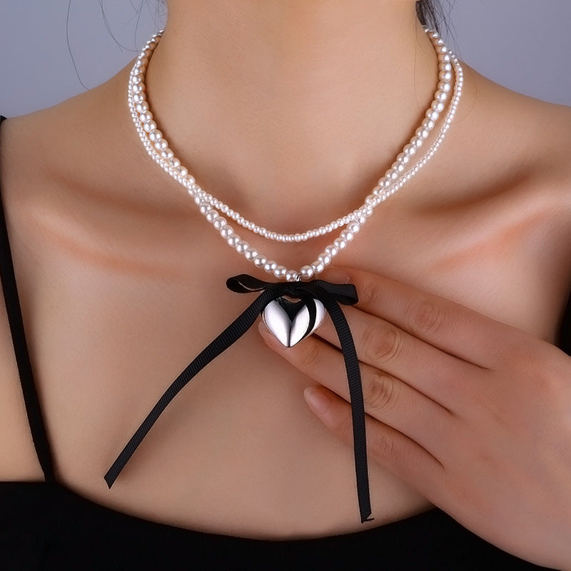 Wholesale Pearl Long Woolen Chain Love Pendant Flannel Bow Necklace