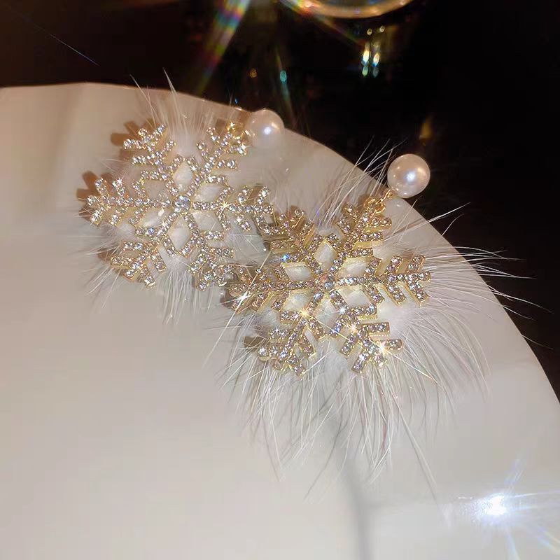 Wholesale White Plush Ball Snowflake Earrings