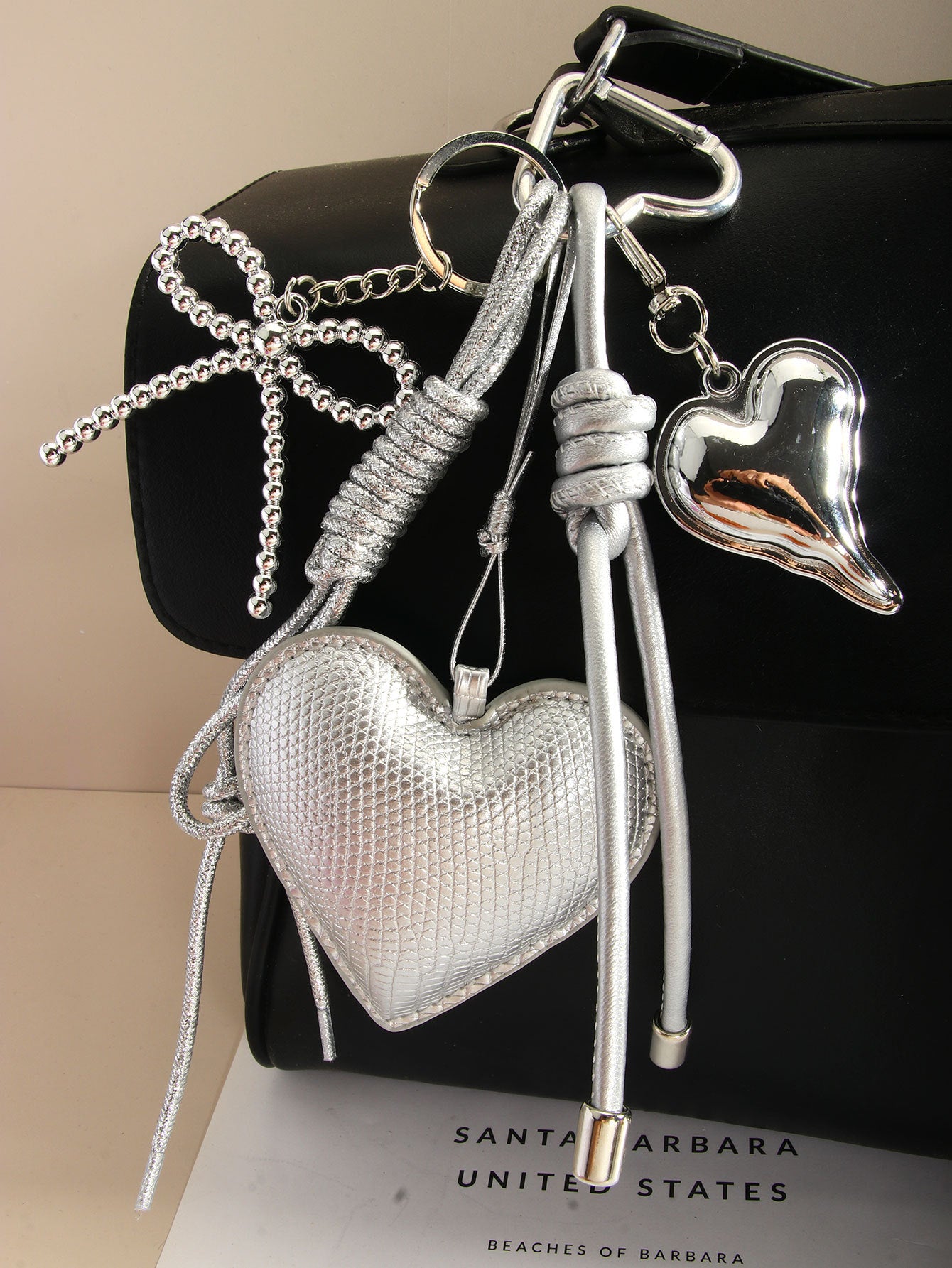 Wholesale PU leather heart-shaped bowknot woven rope bag keychain