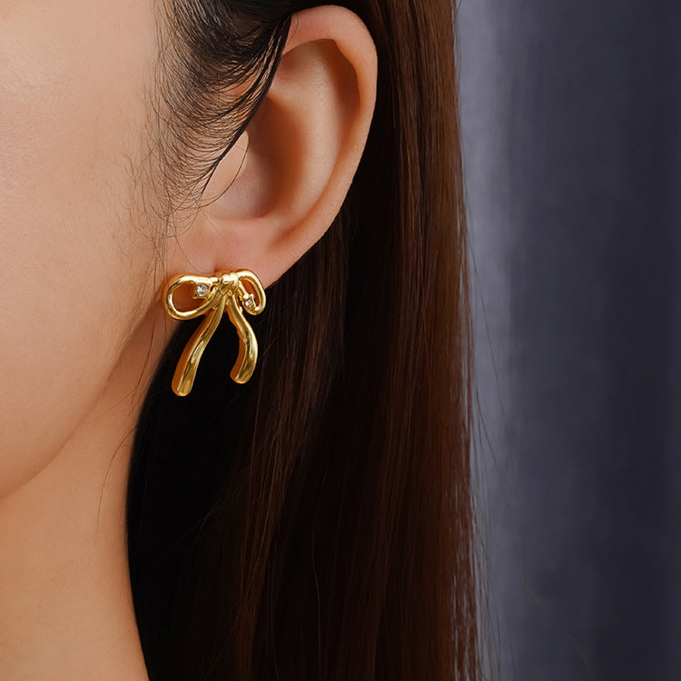 Wholesale bow stainless steel  18K gold earrings