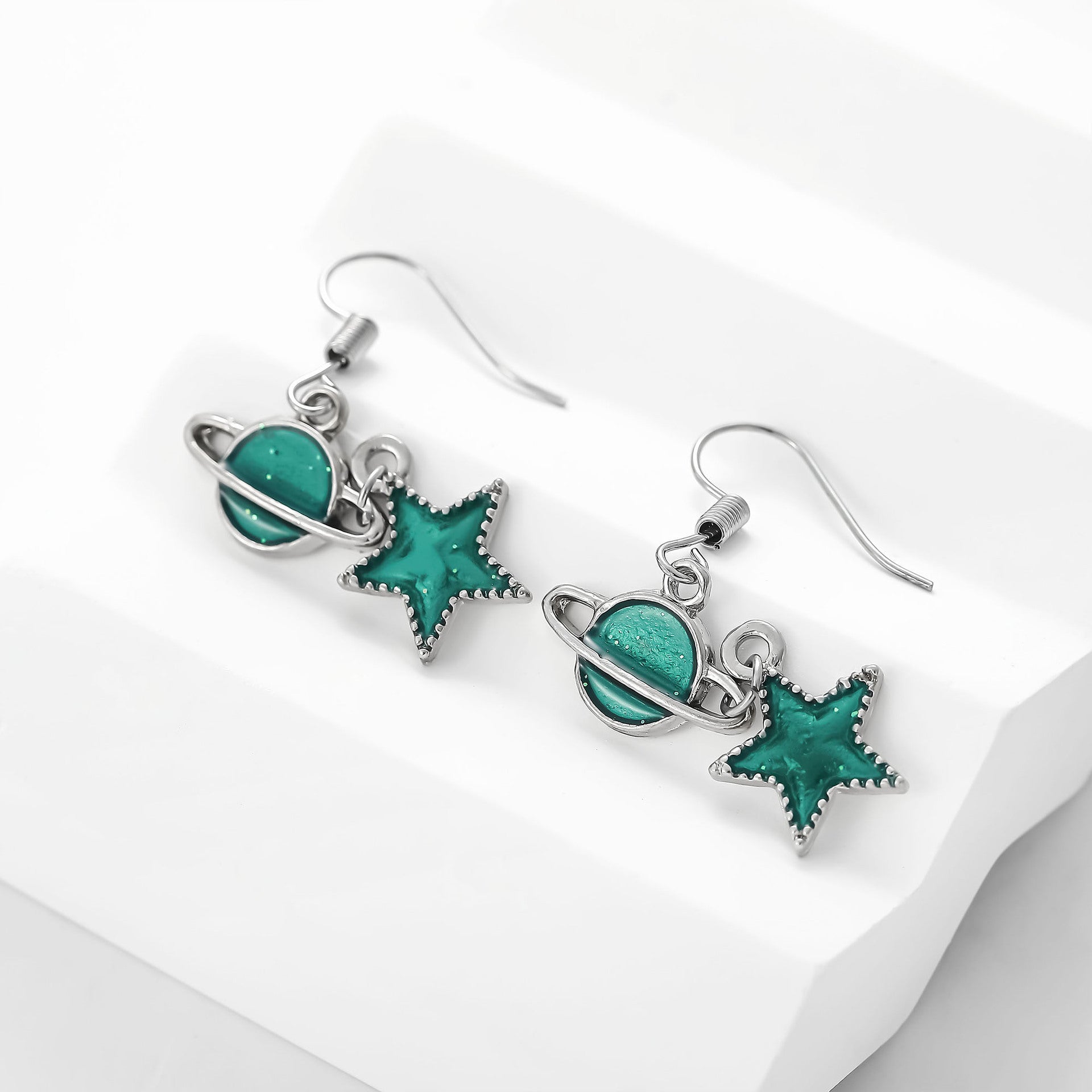 Wholesale Oil dripping star and moon shaped planet asymmetric 4 pairs of earrings set