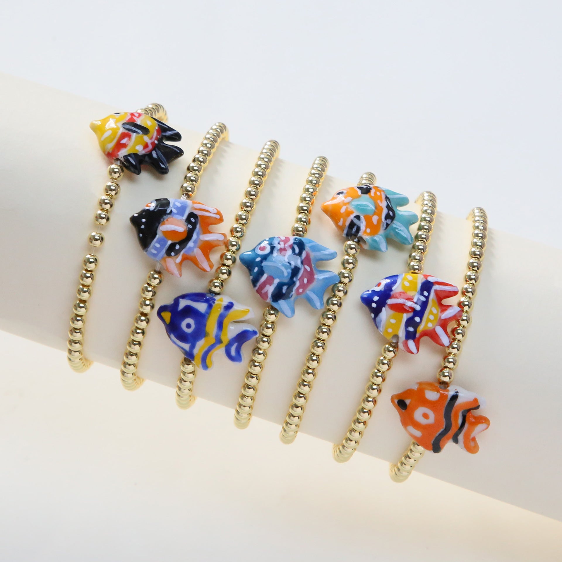 Wholesale Beach style ceramic glass colorful fish elastic rope copper bead bracelet