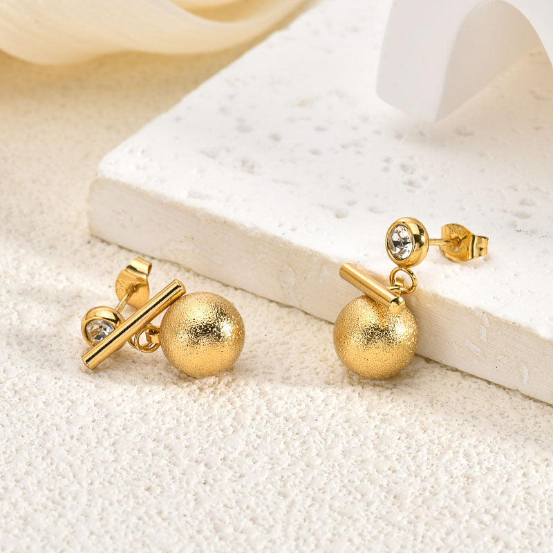 Wholesale Stainless steel cross cat eye earrings