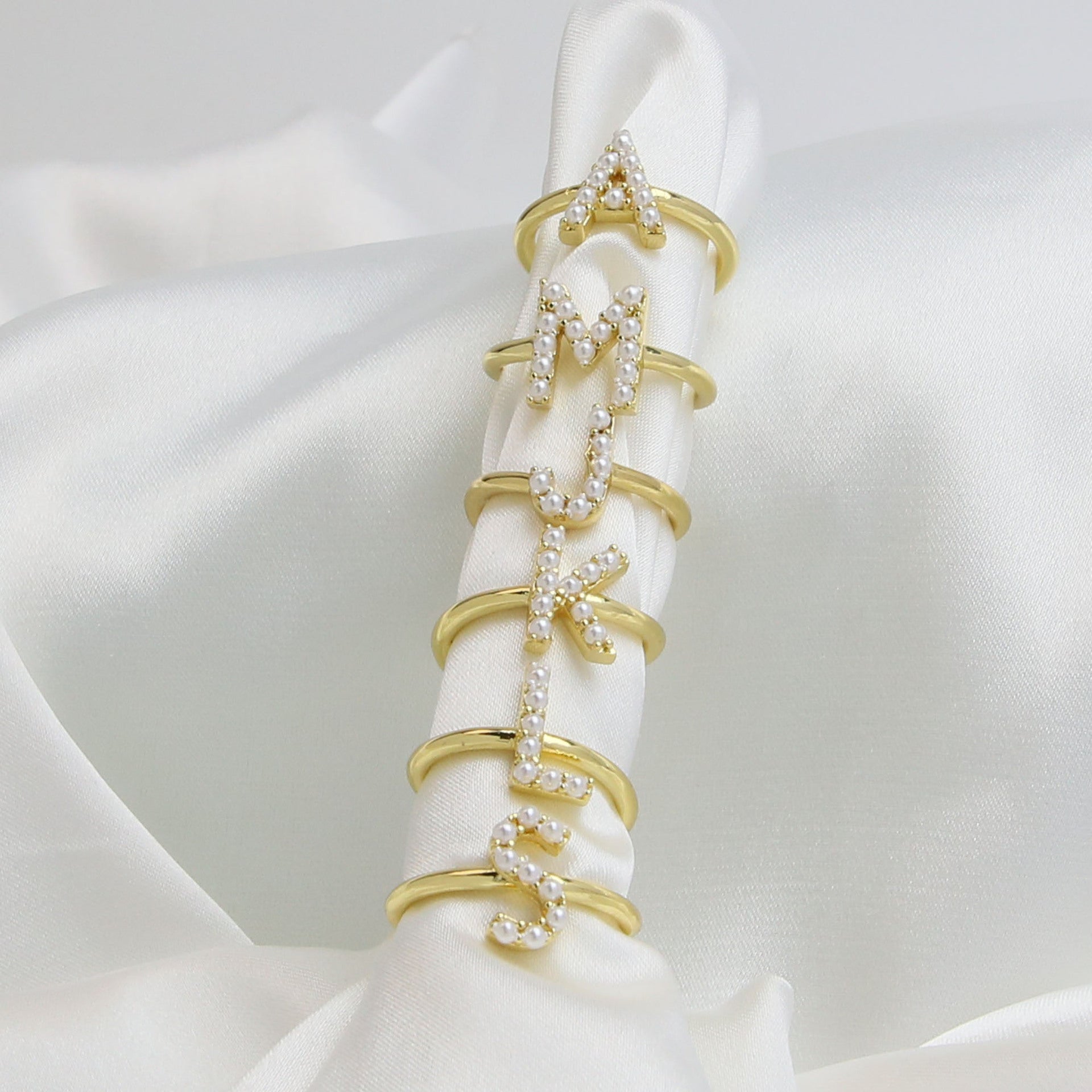 Wholesale  brass pearl 26 English letters open ladies ring
