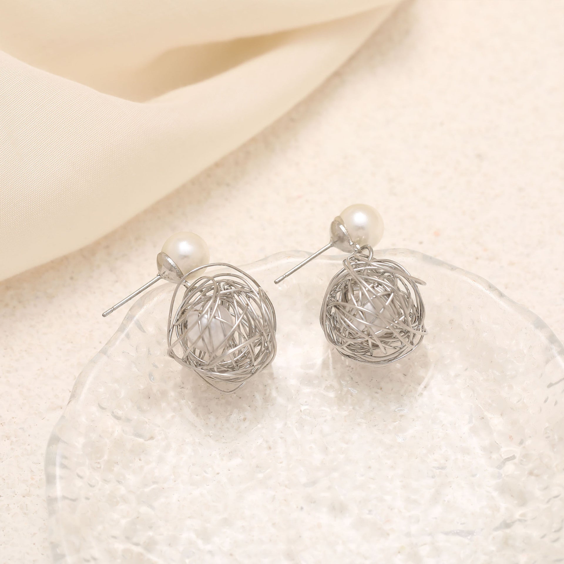 Wholesale personalized earrings  alloy winding pearl earrings