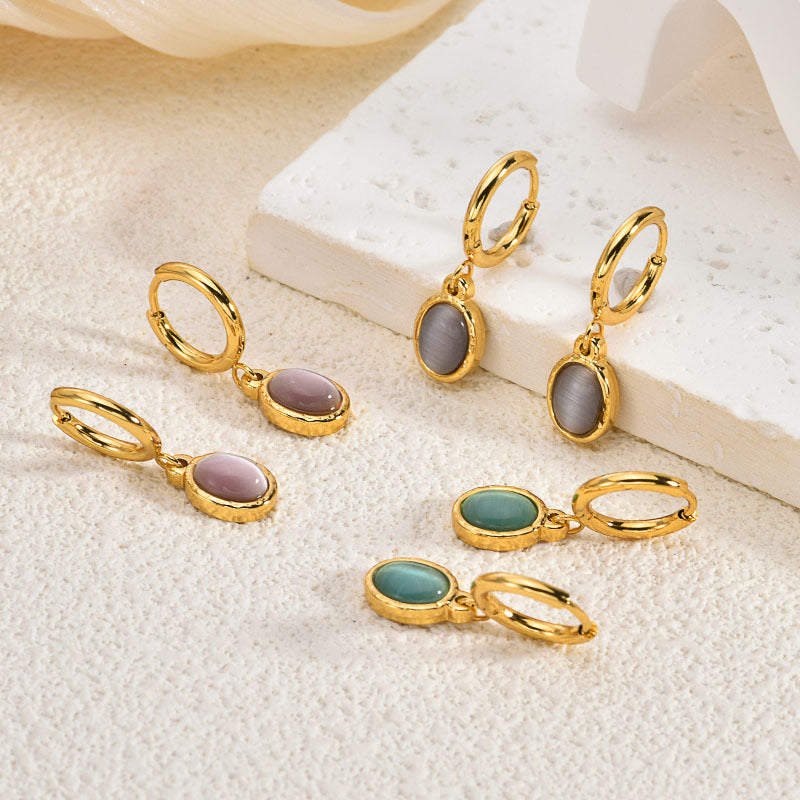 Wholesale Stainless steel cross cat eye earrings