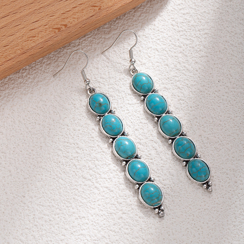 Wholesale Retro long exaggerated earrings for women alloy inlaid with white turquoise long earrings