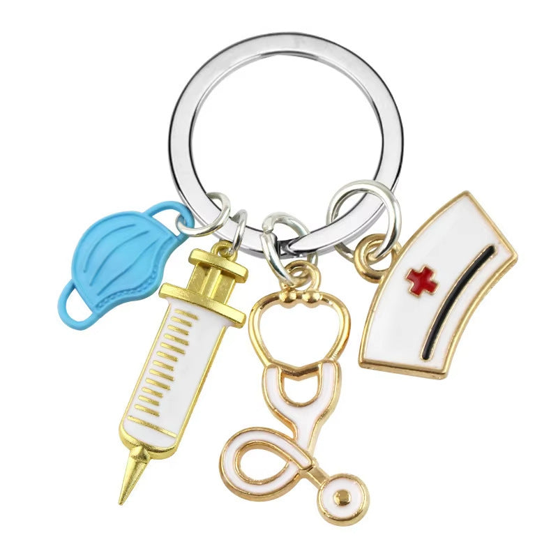 Wholesale Metal Nurse Medical Keychain Pink Stethoscope Cross Design Gift Bag Charm Decorative Accessory