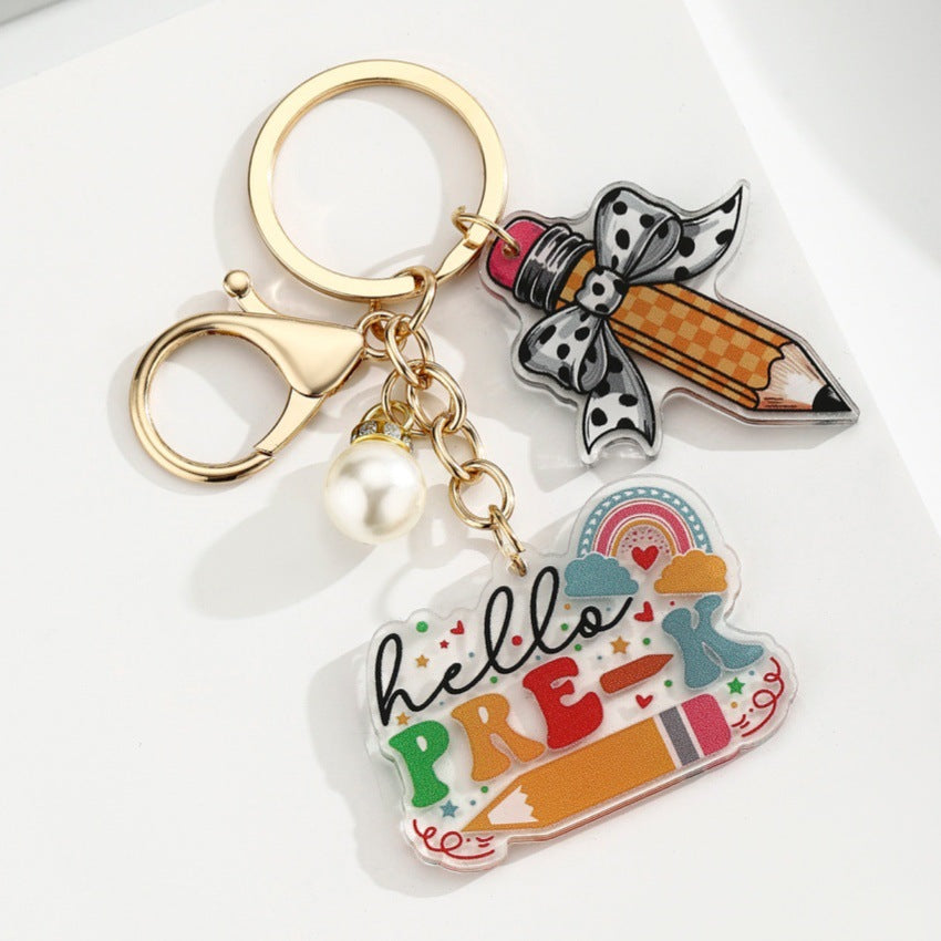 Portachiavi a matita con slogan e lettera di perle di libro acrilico all'ingrosso