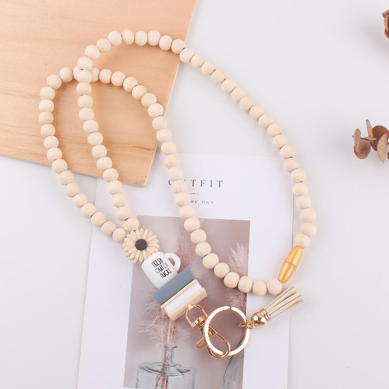 Wholesale Wooden Bead Necklace Keychain Silicone Daisy Book Beaded Tassel Necklace