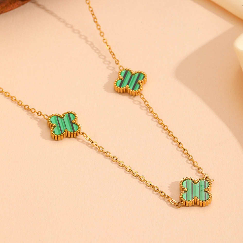 Wholesale Fashion stainless steel three four-leaf flower jewelry new titanium steel does not fade small flower jewelry suit
