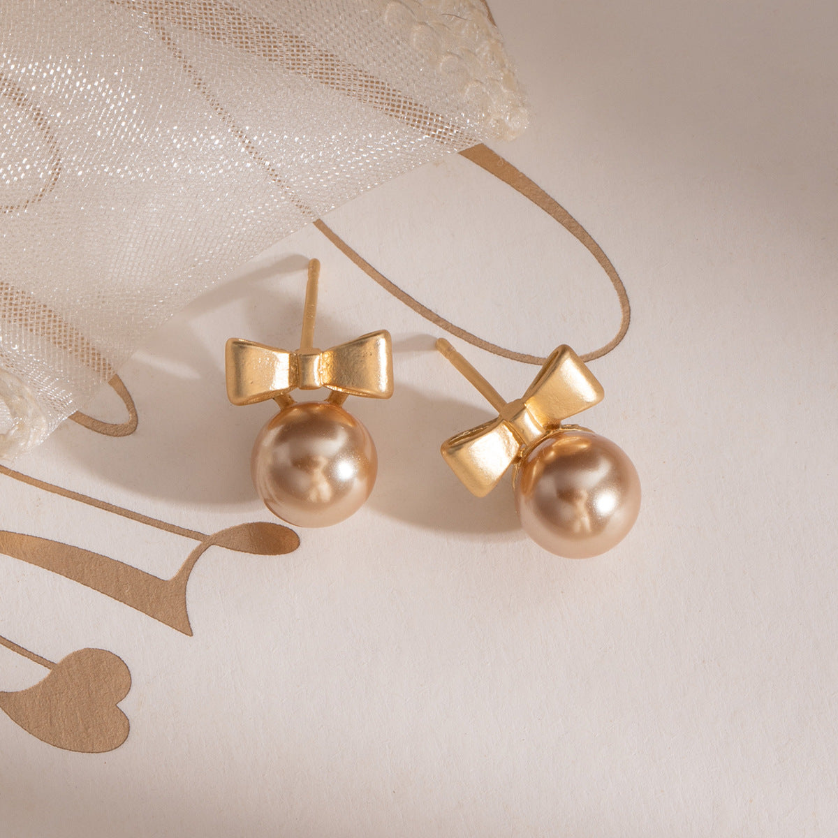 Wholesale Silver Needle Bow Pearl Earrings