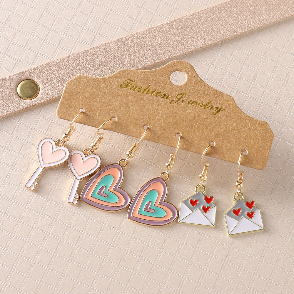 Wholesale Heart-shaped key love letter dripping oil earring set