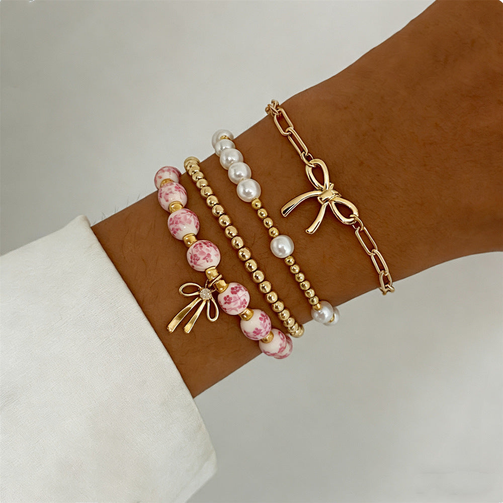 Wholesale Alloy Man-made Pearl Bow Bracelet