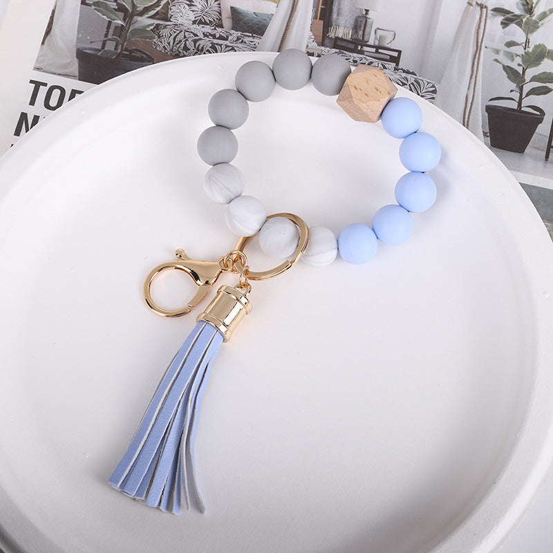 Wholesale Trendy Silicone Bead Bracelet With Tassel Wooden Bead Keychain Natural Geometry Style Chic Jewelry Accessory Gift