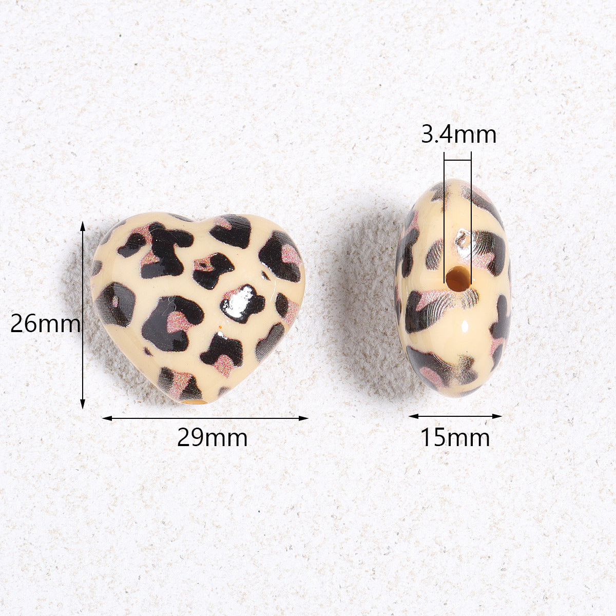Wholesale 5pcs Acrylic Beads of colorful leopard print heart-shaped acrylic beads for DIY crafts.